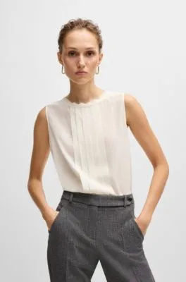 Pleat-front sleeveless blouse in washed silk