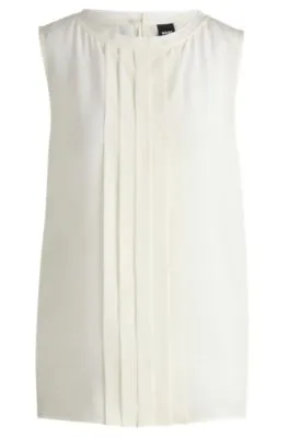 Pleat-front sleeveless blouse in washed silk